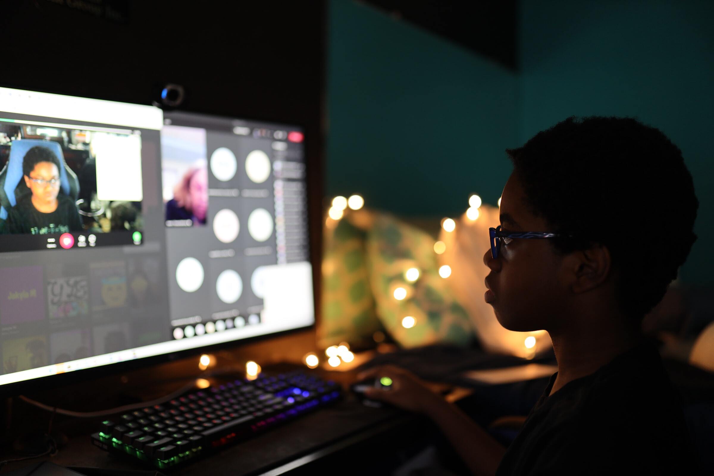 A student creating a game during an online class